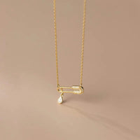 GOLD PIN NECKLACE